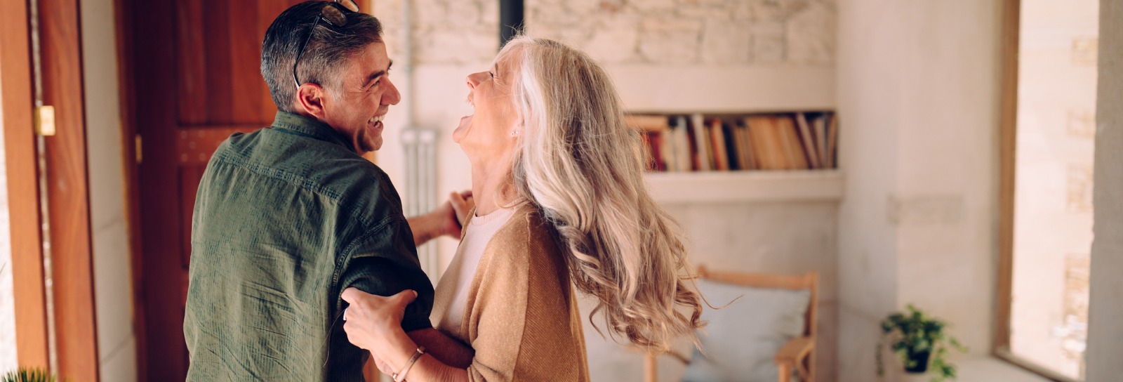 Senior couple dancing merrily